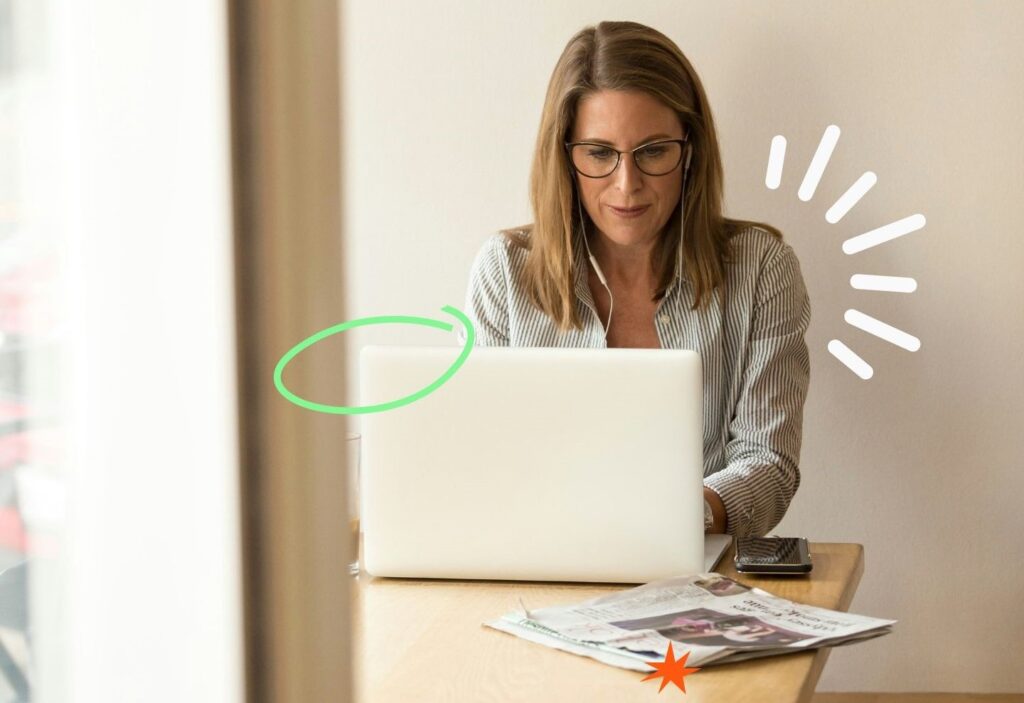 A picture of a woman sitting at a desk, as an example of practicing career coaching